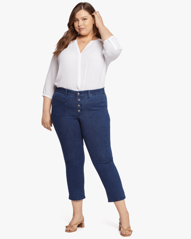 Front of a model wearing a size 0X Marilyn Stretch Straight Leg Pant in Genesis by NYDJ. | dia_product_style_image_id:189408